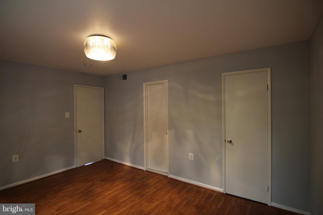 4415 Briarwood Ct N Unit 11, Annandale, VA 22003 - unfurnished bedroom with wood finished floors and baseboards