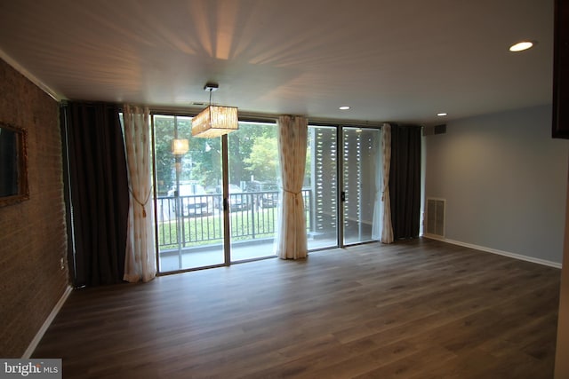 4415 Briarwood Ct N Unit 11, Annandale, VA 22003 - spare room with healthy amount of natural light, dark wood-style floors, baseboards, and recessed lighting