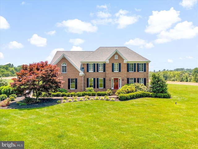 7100 Ewing Ct, Middletown, MD 21769 - view of front of house with a front lawn and brick siding