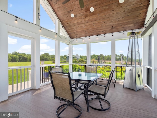 7100 Ewing Ct, Middletown, MD 21769 - sunroom with outdoor dining space, lofted ceiling, and view of wooded area
