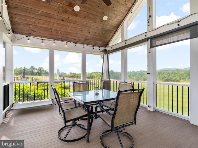 7100 Ewing Ct, Middletown, MD 21769 - sunroom / solarium featuring track lighting, outdoor dining space, vaulted ceiling, and ceiling fan