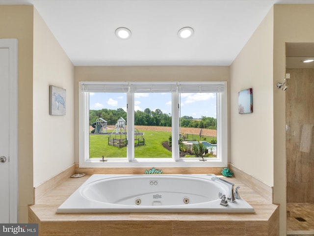 7100 Ewing Ct, Middletown, MD 21769 - bathroom with a jetted tub, a tile shower, and recessed lighting