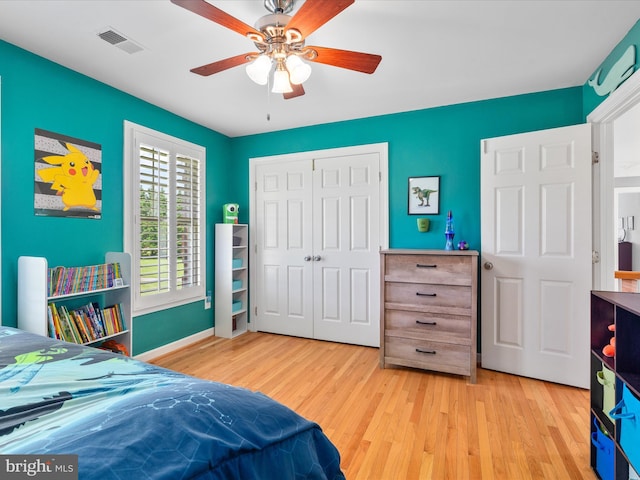 7100 Ewing Ct, Middletown, MD 21769 - bedroom featuring light wood-style flooring, a closet, and ceiling fan