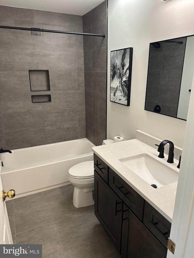 14208 Creekbranch Way, Gainesville, VA 20155 - full bath featuring vanity, toilet, washtub / shower combination, and tile patterned flooring