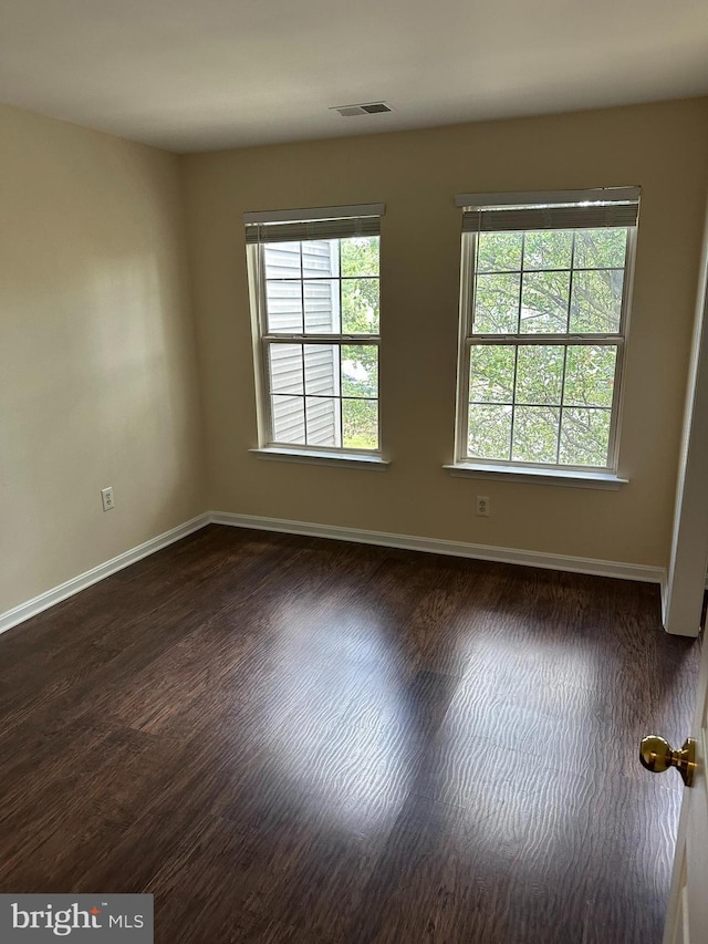 14208 Creekbranch Way, Gainesville, VA 20155 - empty room with baseboards and dark wood-style flooring