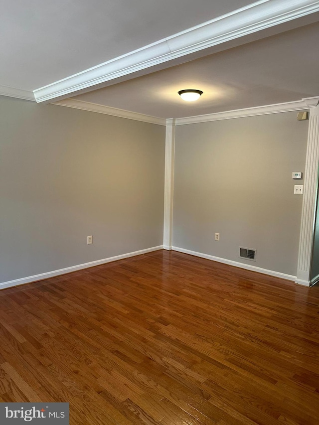 14208 Creekbranch Way, Gainesville, VA 20155 - empty room featuring ornamental molding, dark wood-style floors, and baseboards
