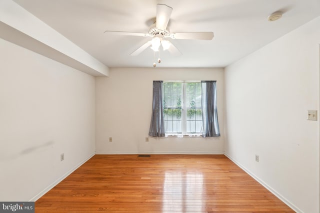 22 Regents Ct, Bensalem, PA 19020 - spare room featuring light wood finished floors, ceiling fan, baseboards, and a smoke detector
