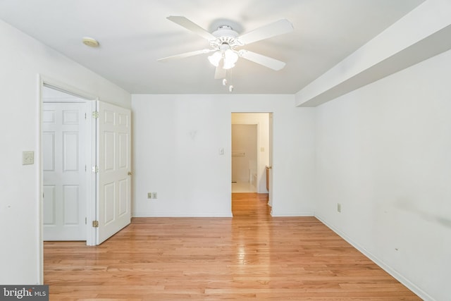 22 Regents Ct, Bensalem, PA 19020 - spare room with light wood-type flooring, ceiling fan, a smoke detector, and baseboards
