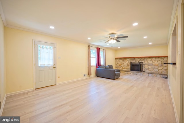30 Lancelot Ln, Mount Laurel, NJ 08054 - unfurnished living room featuring crown molding, light wood finished floors, a ceiling fan, recessed lighting, and a fireplace