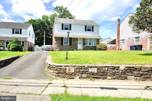 812 Jenkintown Rd, Elkins Park, PA 19027 - traditional-style home featuring stone siding and asphalt driveway