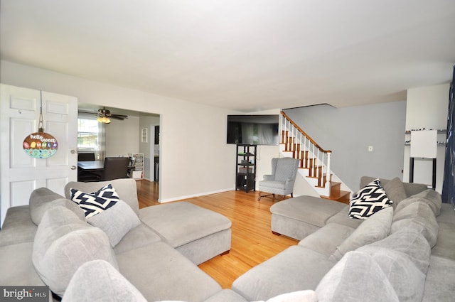 812 Jenkintown Rd, Elkins Park, PA 19027 - living area featuring stairway, wood finished floors, ceiling fan, and baseboards