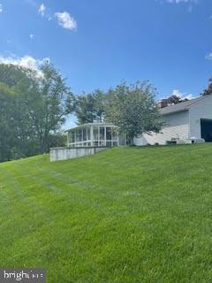 219 Skycrest Dr, Landenberg, PA 19350 - view of grassy yard featuring a sunroom