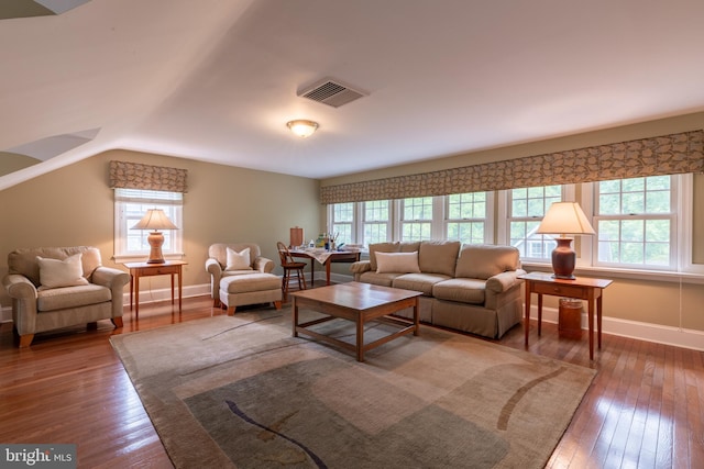 410 Heatherwood Ln, Devon, PA 19333 - living room featuring healthy amount of natural light, wood-type flooring, baseboards, and lofted ceiling