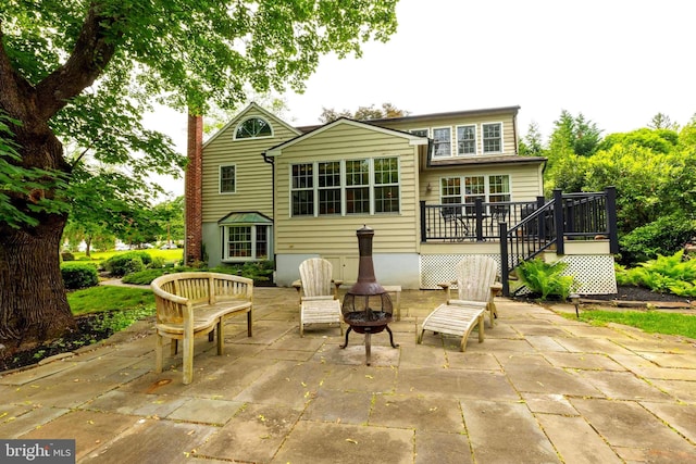410 Heatherwood Ln, Devon, PA 19333 - back of house featuring a patio area, a wooden deck, stairway, and an outdoor fire pit