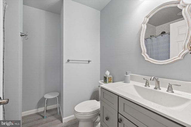 36032 Double Bridges Rd, Frankford, DE 19945 - bathroom with a shower with curtain, vanity, and wood finished floors