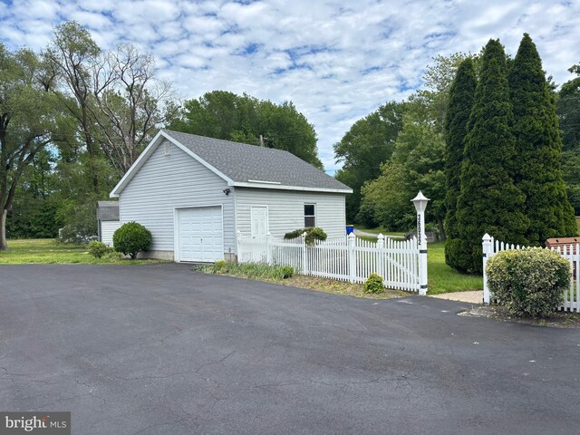 36032 Double Bridges Rd, Frankford, DE 19945 - detached garage featuring asphalt driveway