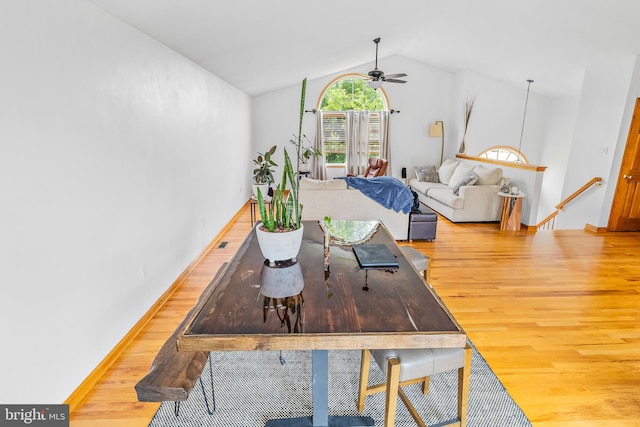 362 Sudley Ln, Martinsburg, WV 25403 - dining space with light wood-style floors, vaulted ceiling, a ceiling fan, and baseboards