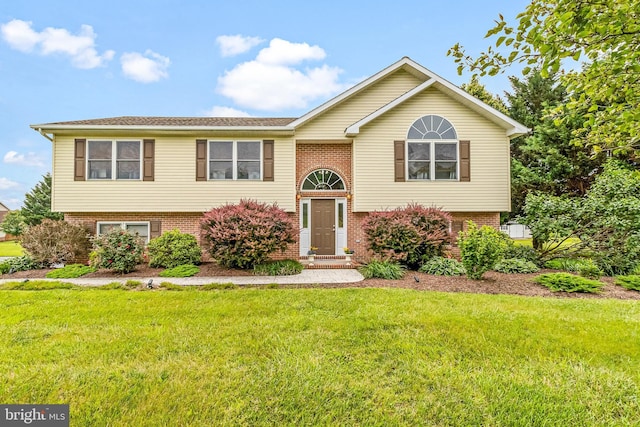 362 Sudley Ln, Martinsburg, WV 25403 - split foyer home with brick siding and a front lawn