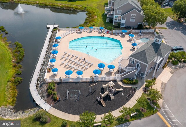 38178 Dockside Dr Unit 1266, Selbyville, DE 19975 - drone / aerial view of a pool area and a large body of water