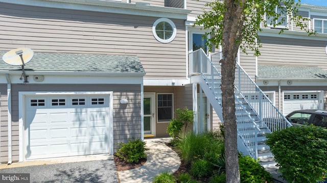 38178 Dockside Dr Unit 1266, Selbyville, DE 19975 - property entrance featuring an attached garage and a shingled roof