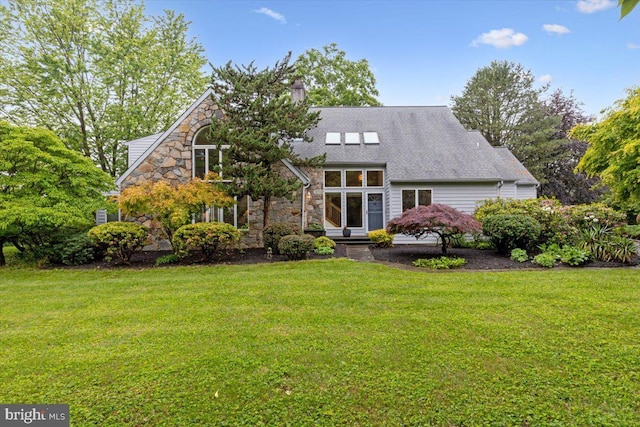3 White Horse Ln, Spring City, PA 19475 - rear view of property with a lawn, stone siding, and roof with shingles