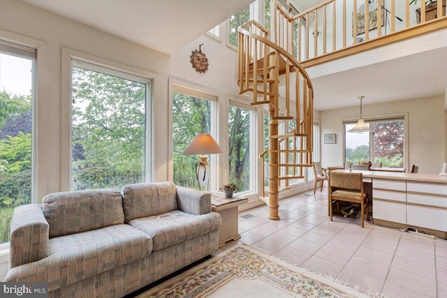3 White Horse Ln, Spring City, PA 19475 - living area with light tile patterned floors and a high ceiling