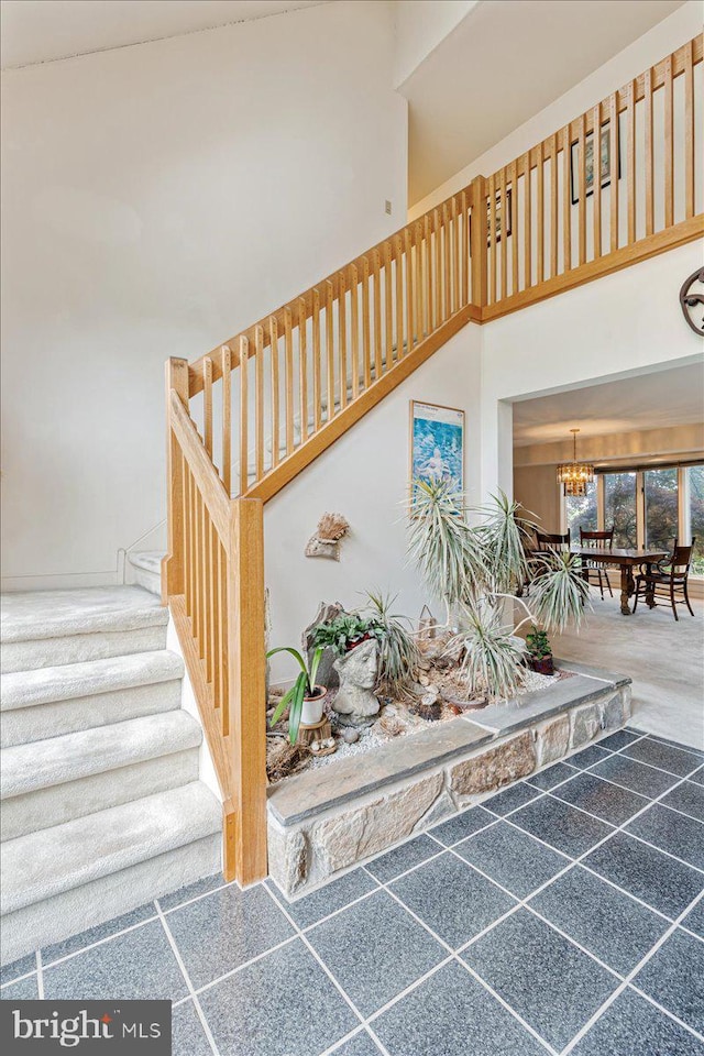 3 White Horse Ln, Spring City, PA 19475 - staircase with a chandelier and a towering ceiling
