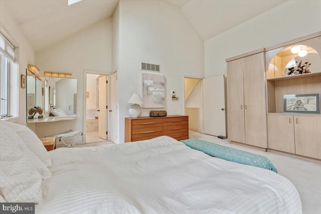 3 White Horse Ln, Spring City, PA 19475 - bedroom with high vaulted ceiling, light carpet, and connected bathroom