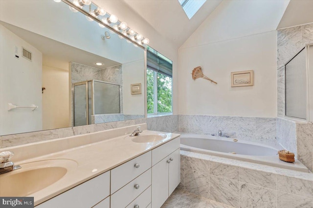 3 White Horse Ln, Spring City, PA 19475 - bathroom featuring a bath, double vanity, a shower stall, a skylight, and lofted ceiling