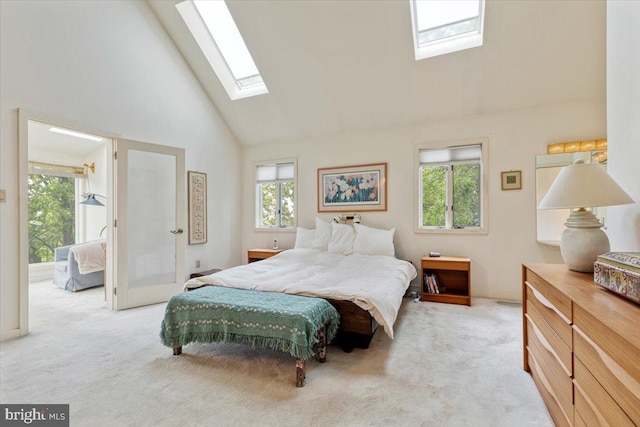 3 White Horse Ln, Spring City, PA 19475 - bedroom featuring a skylight, high vaulted ceiling, multiple windows, and light colored carpet