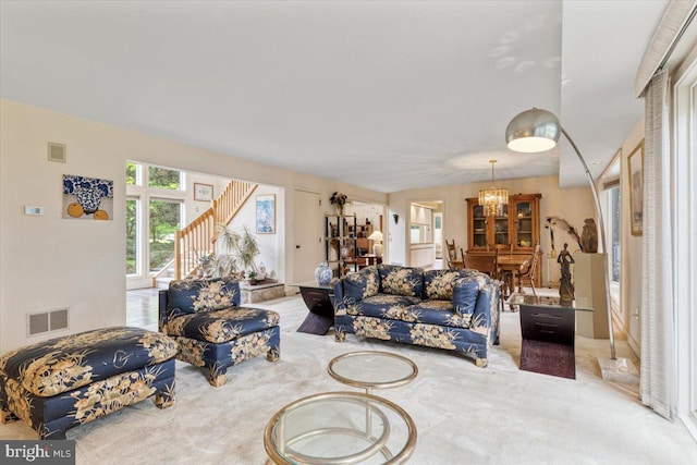 3 White Horse Ln, Spring City, PA 19475 - carpeted living area featuring a chandelier and stairs