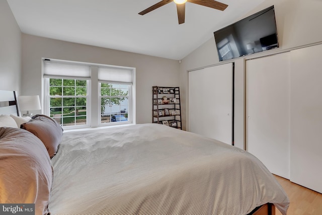 3331 Lakeside View Dr Unit 6-8, Falls Church, VA 22041 - bedroom featuring vaulted ceiling, multiple closets, wood finished floors, and ceiling fan