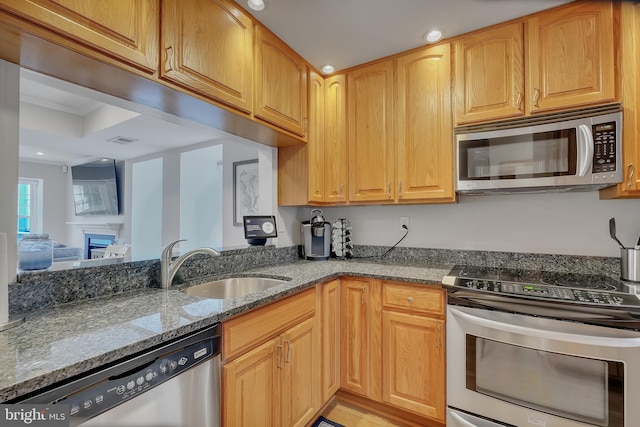 3331 Lakeside View Dr Unit 6-8, Falls Church, VA 22041 - kitchen featuring stainless steel appliances, a sink, dark stone counters, and recessed lighting