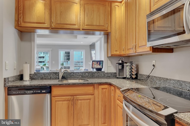 3331 Lakeside View Dr Unit 6-8, Falls Church, VA 22041 - kitchen with stainless steel appliances, a sink, and dark stone counters