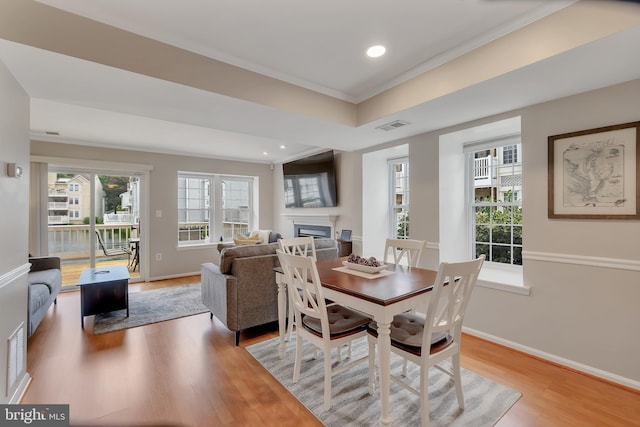 3331 Lakeside View Dr Unit 6-8, Falls Church, VA 22041 - dining room featuring a fireplace, light wood finished floors, crown molding, baseboards, and recessed lighting