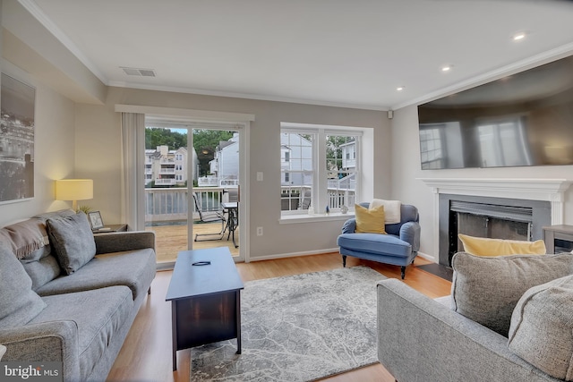 3331 Lakeside View Dr Unit 6-8, Falls Church, VA 22041 - living area with ornamental molding, a fireplace with flush hearth, wood finished floors, recessed lighting, and baseboards