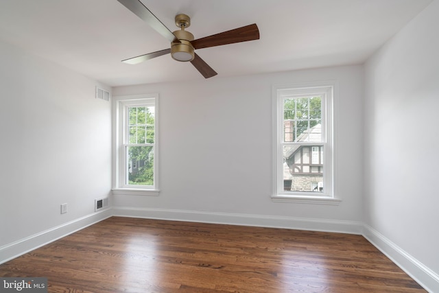 2304 W 19th St, Wilmington, DE 19806 - empty room featuring ceiling fan, dark wood-type flooring, and baseboards
