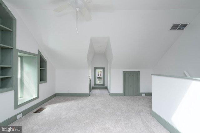 2304 W 19th St, Wilmington, DE 19806 - bonus room featuring carpet, lofted ceiling, built in shelves, baseboards, and ceiling fan