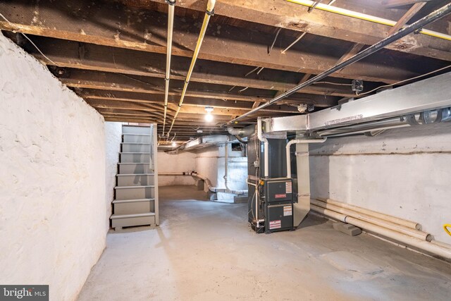 2304 W 19th St, Wilmington, DE 19806 - unfinished below grade area featuring heating unit and stairs