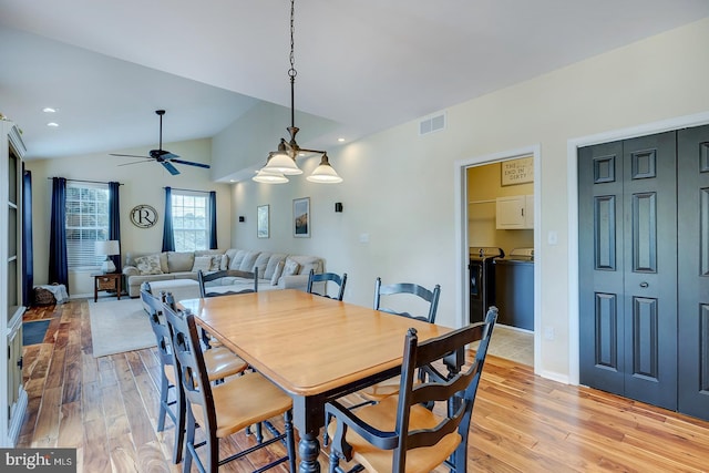 229 Lakshman Trl, Dover, DE 19904 - dining area with washing machine and clothes dryer, light wood-style floors, lofted ceiling, a ceiling fan, and baseboards