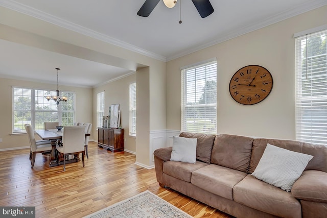 229 Lakshman Trl, Dover, DE 19904 - living area with ceiling fan, light wood finished floors, healthy amount of natural light, ornamental molding, and a chandelier