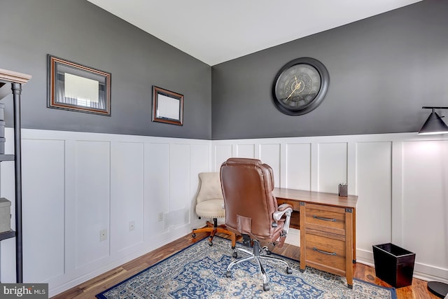 229 Lakshman Trl, Dover, DE 19904 - office space featuring a decorative wall, wood finished floors, and a wainscoted wall