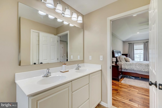 229 Lakshman Trl, Dover, DE 19904 - ensuite bathroom with double vanity and wood finished floors