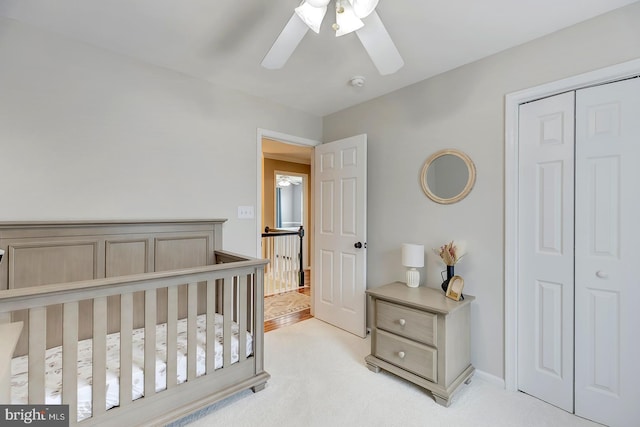 229 Lakshman Trl, Dover, DE 19904 - bedroom with light carpet, a closet, and a ceiling fan