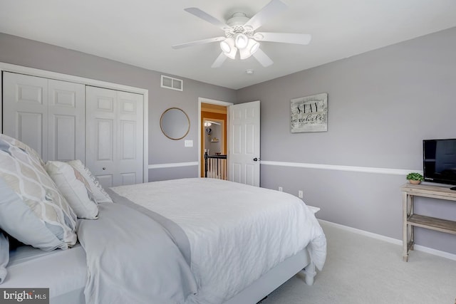 229 Lakshman Trl, Dover, DE 19904 - bedroom with carpet flooring, a closet, baseboards, and a ceiling fan