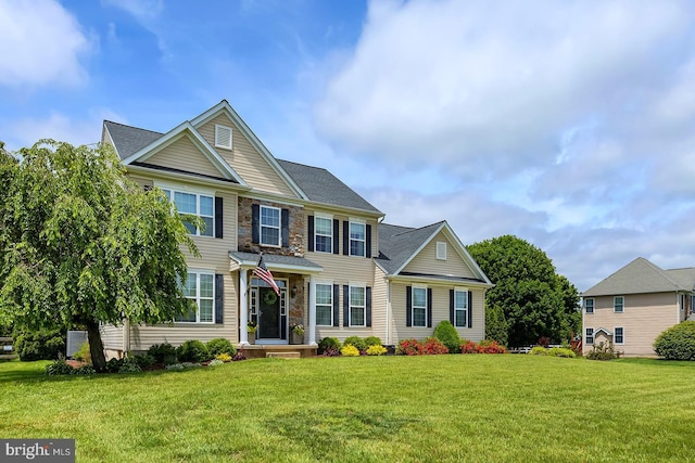 229 Lakshman Trl, Dover, DE 19904 - view of front of house with a front yard and a shingled roof