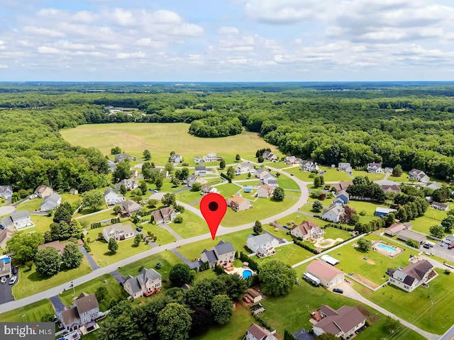 229 Lakshman Trl, Dover, DE 19904 - aerial perspective of suburban area featuring a heavily wooded area