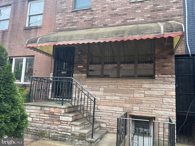 914 Fernon St, Philadelphia, PA 19148 - entrance to property with brick siding and stone siding