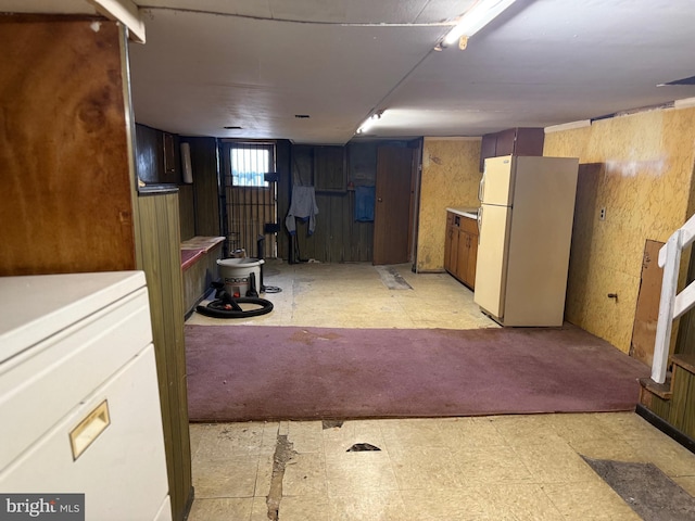 914 Fernon St, Philadelphia, PA 19148 - basement with freestanding refrigerator and light flooring