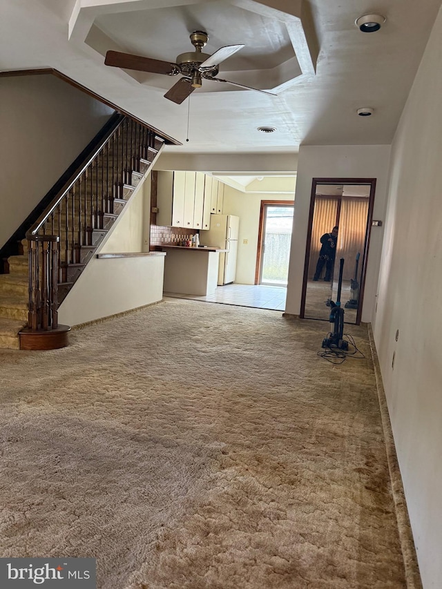914 Fernon St, Philadelphia, PA 19148 - unfurnished living room featuring ceiling fan, carpet flooring, and stairway